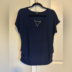 Women’s large navy blue blouse with gold accent piece in neckline. AUW brand.